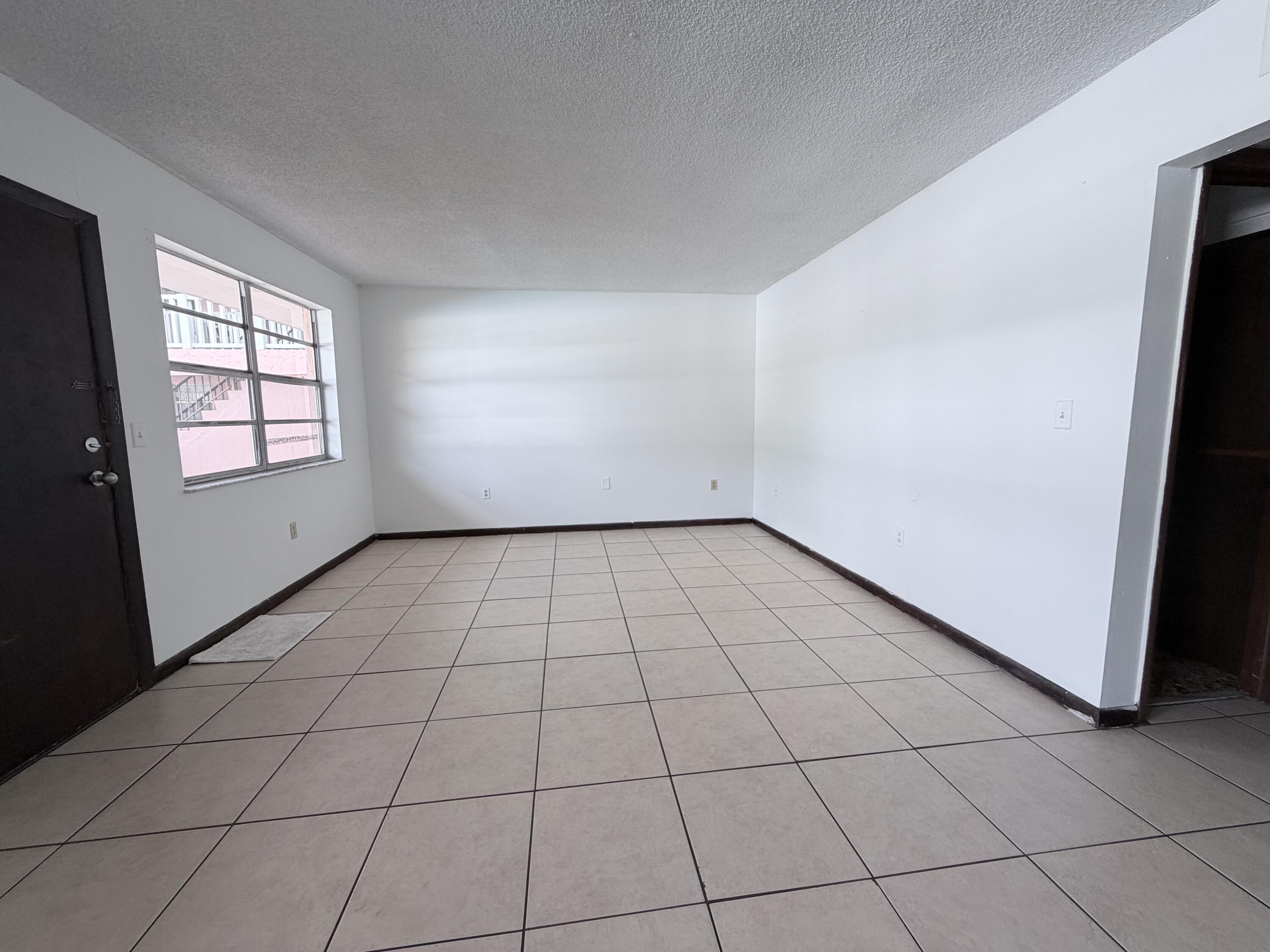 6050 Southwest 27th Street Miramar, FL 33023 - Photo 10 of 40 an empty room with windows