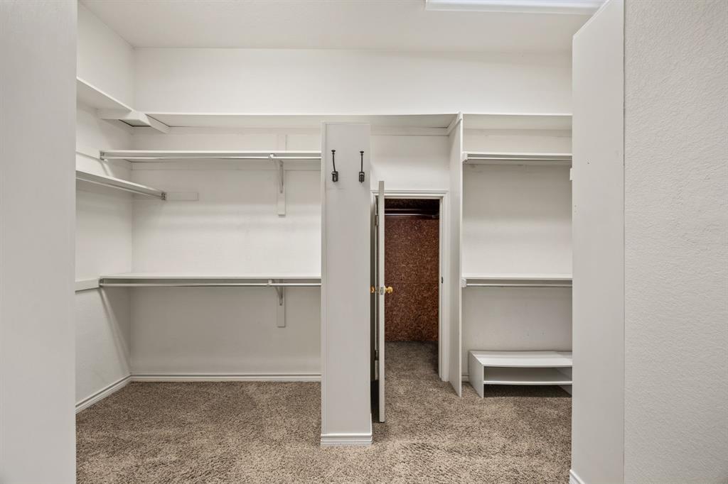 801 Spring Canyon Drive Irving, TX 75063 - Photo 29 of 40 a view of an empty walk in closet
