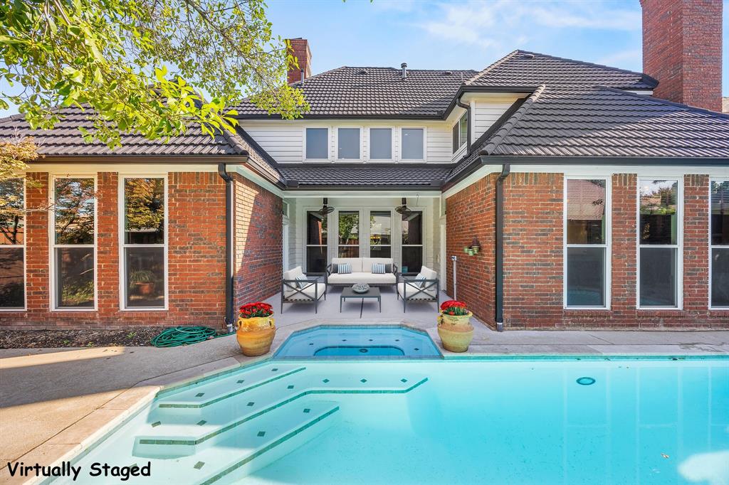 801 Spring Canyon Drive Irving, TX 75063 - Photo 36 of 40 front view of a house with a patio