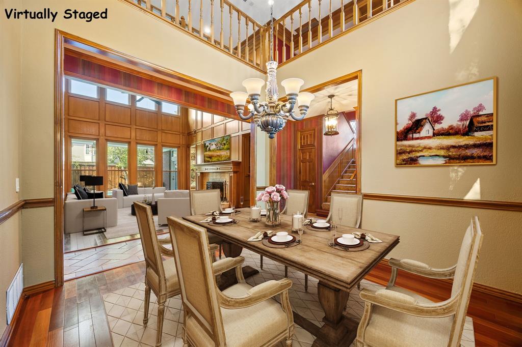 801 Spring Canyon Drive Irving, TX 75063 - Photo 5 of 40 a view of a dining room with furniture wooden floor and chandelier