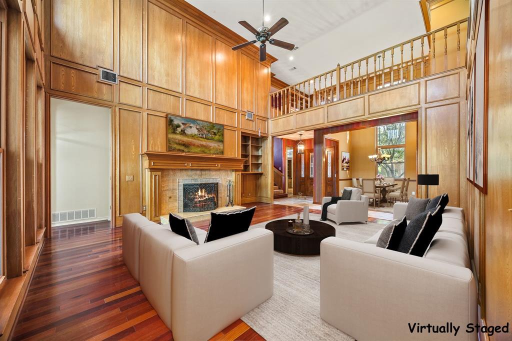 801 Spring Canyon Drive Irving, TX 75063 - Photo 10 of 40 a living room with fireplace furniture and a large window