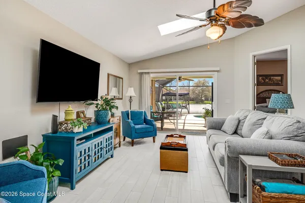 a building outdoor space with patio furniture and potted plants