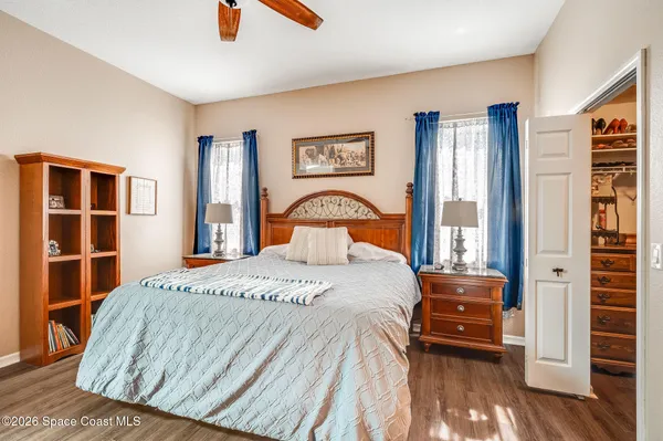 a view of a swimming pool with a patio