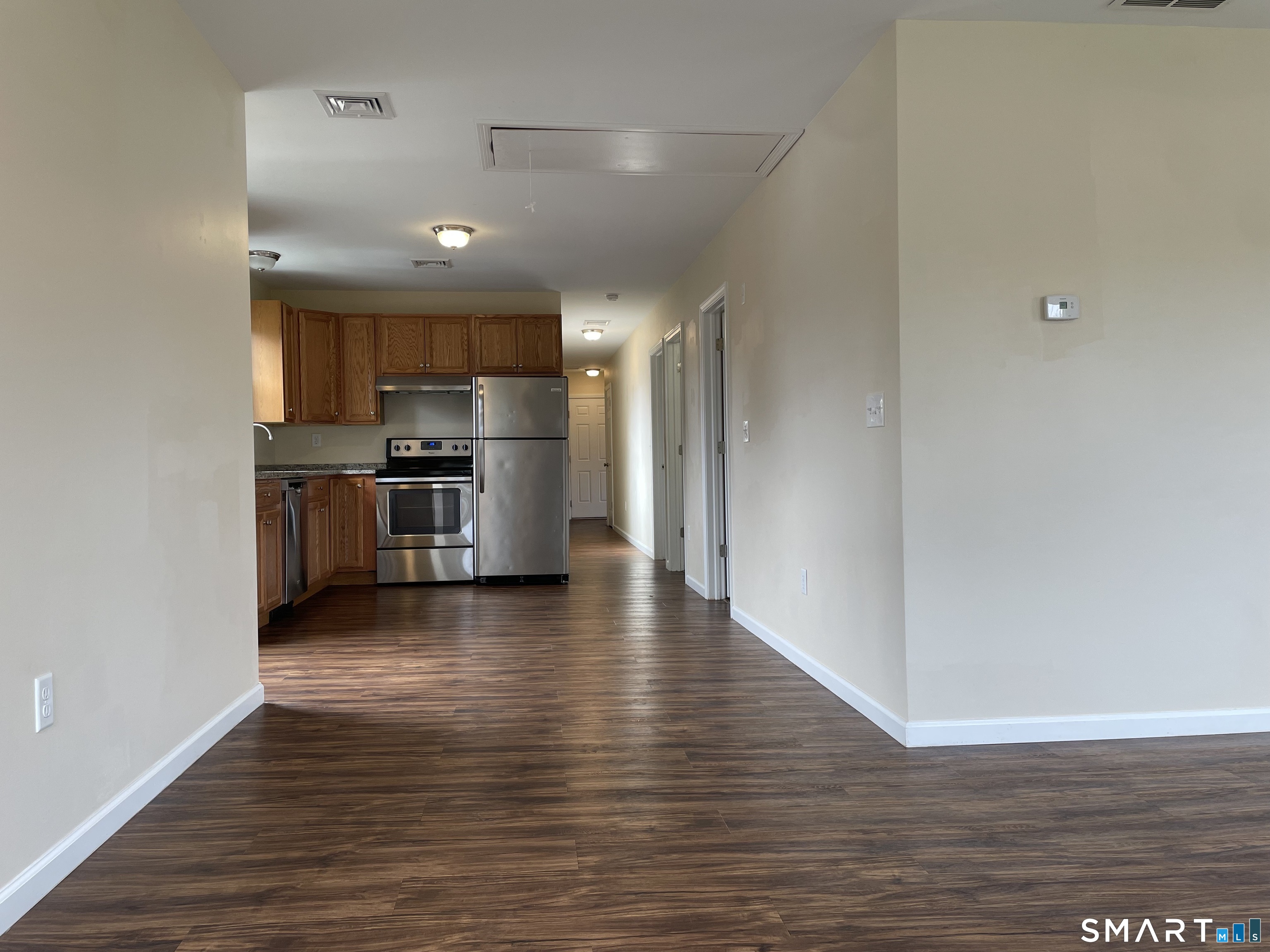 522 Worthington Ridge Berlin, CT 06037 - Photo 11 of 20 Living Room through kitchen, into hallway