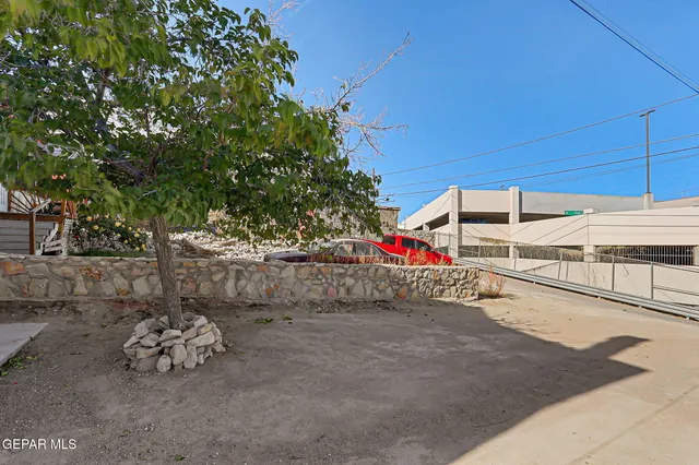 a view of a street with lots of trees