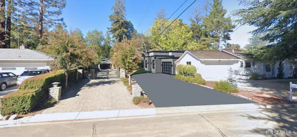 a view of a back yard of the house