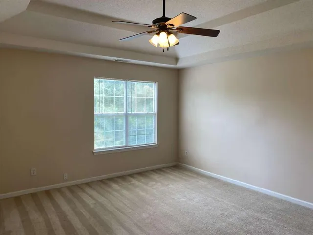 a kitchen with a sink and a stove top oven