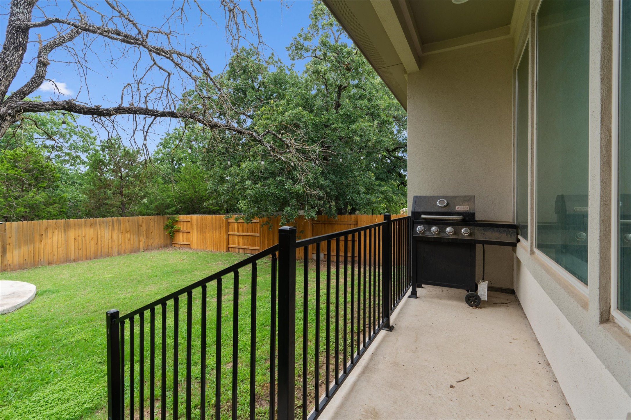 941 Del Raphael Drive Leander, TX 78641 - Photo 21 of 31 Step right outside to a covered patio that acts like a second living room during the spring and fall