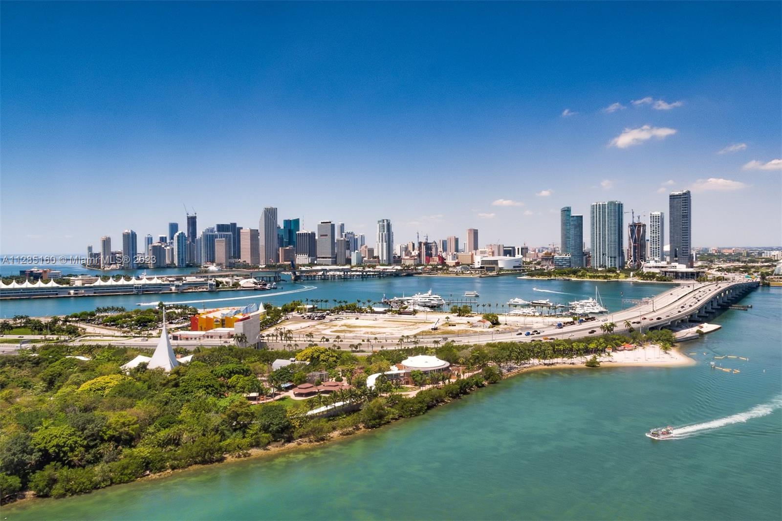 1000 Venetian Way, Unit 508 Miami Beach, FL 33139 - Photo 1 of 27 a view of a water with a large pool