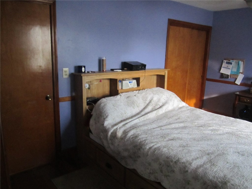 25 Brookdale Road Middletown, RI 02842 - Photo 11 of 19 Bedroom one. Left doorway goes to hall