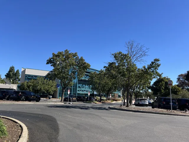 a view of a street with a building in the background