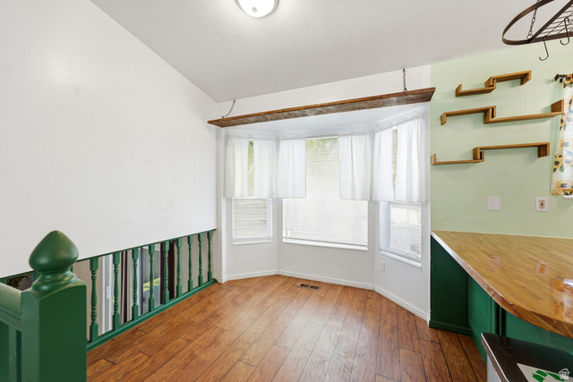 2475 Church Street Layton, UT 84040 - Photo 7 of 27 Bay window area featuring wood-finish flooring and a white color palette