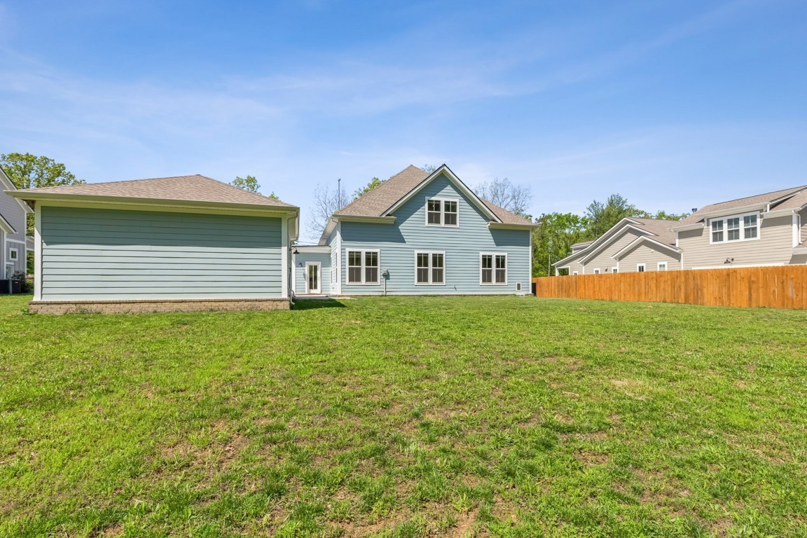 7205 Lake Road Northwest Fairview, TN 37062 - Photo 25 of 28 a front view of a house with a yard