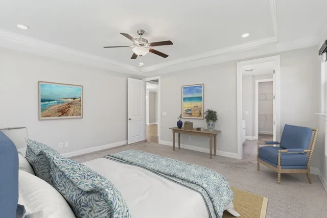 a bedroom with a bed and a chair