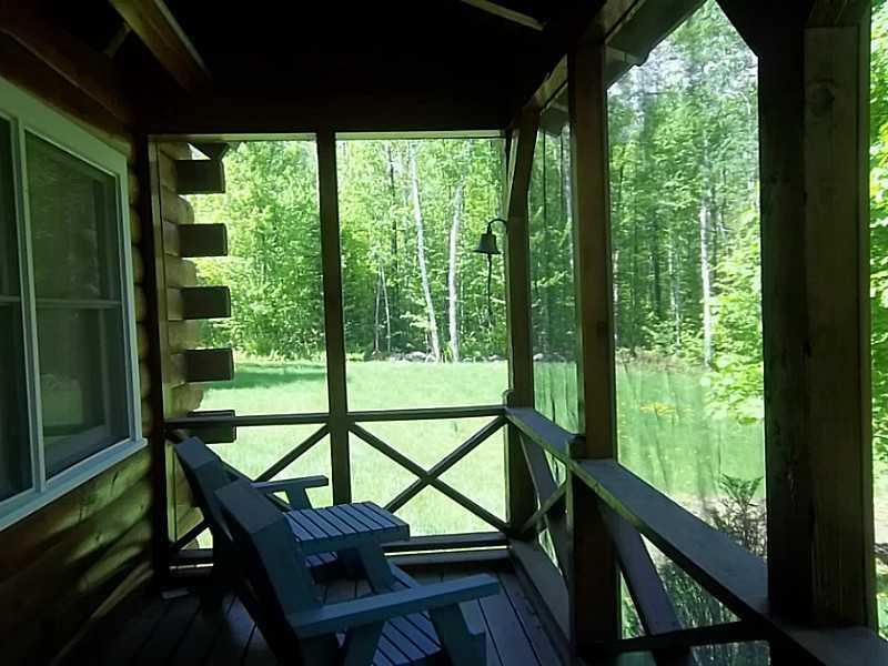 176 Stephens Road Oquossoc, ME 04964 - Photo 4 of 30 Sunroom. Screened porch