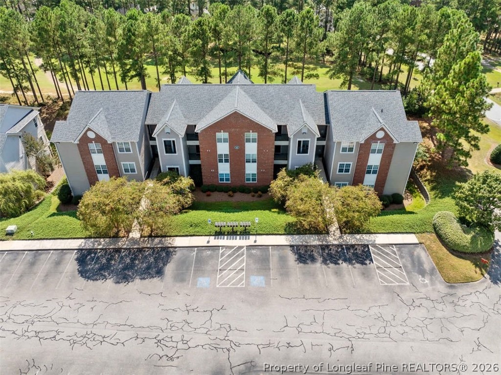 62 Gallery Drive, Unit 102 Spring Lake, NC 28390 - Photo 1 of 23 front view of a house with a yard
