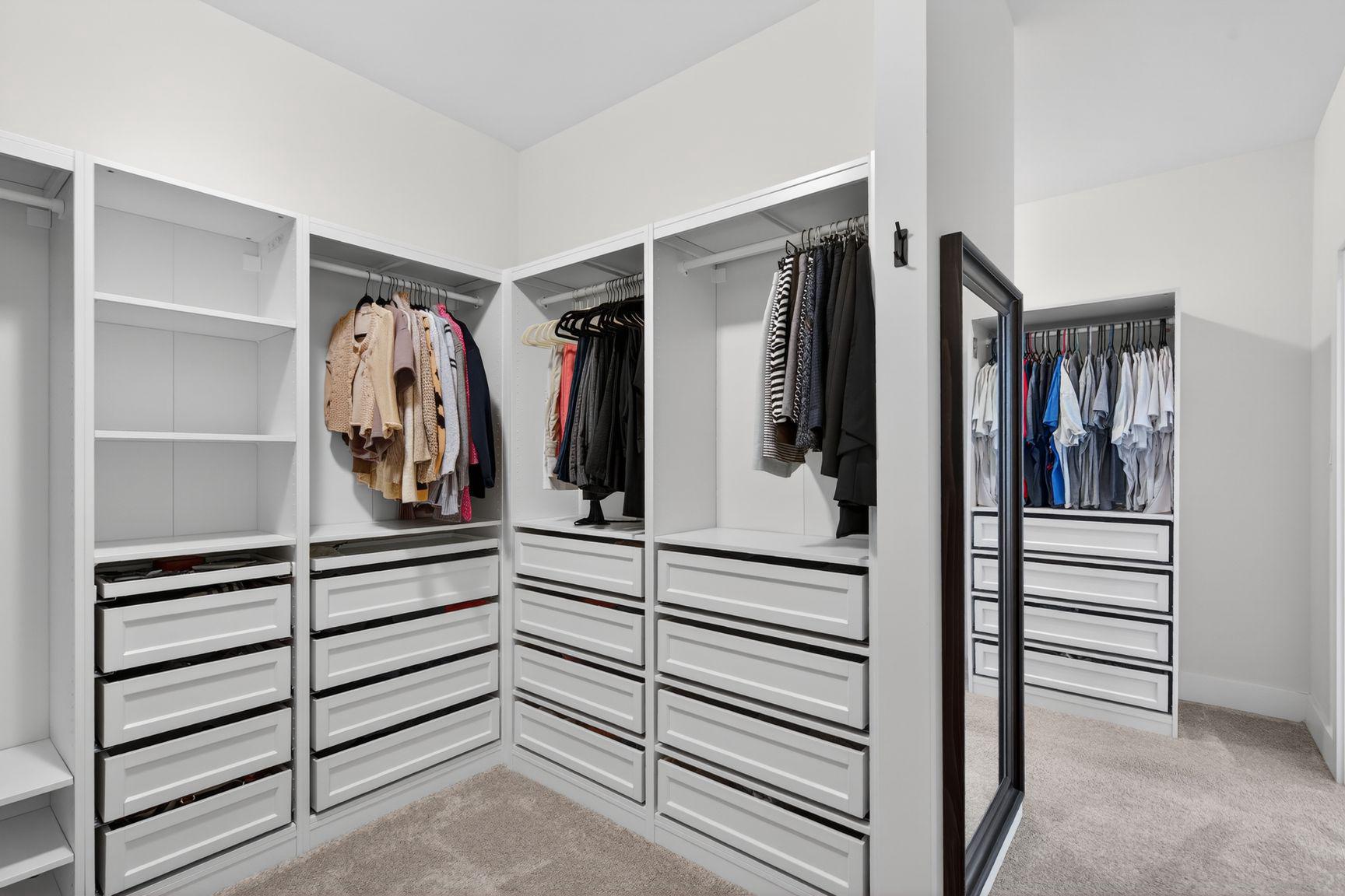 6213 Mcconnell Lane Springfield, VA 22152 - Photo 22 of 39 a view of walk in closet with clothes and shoes