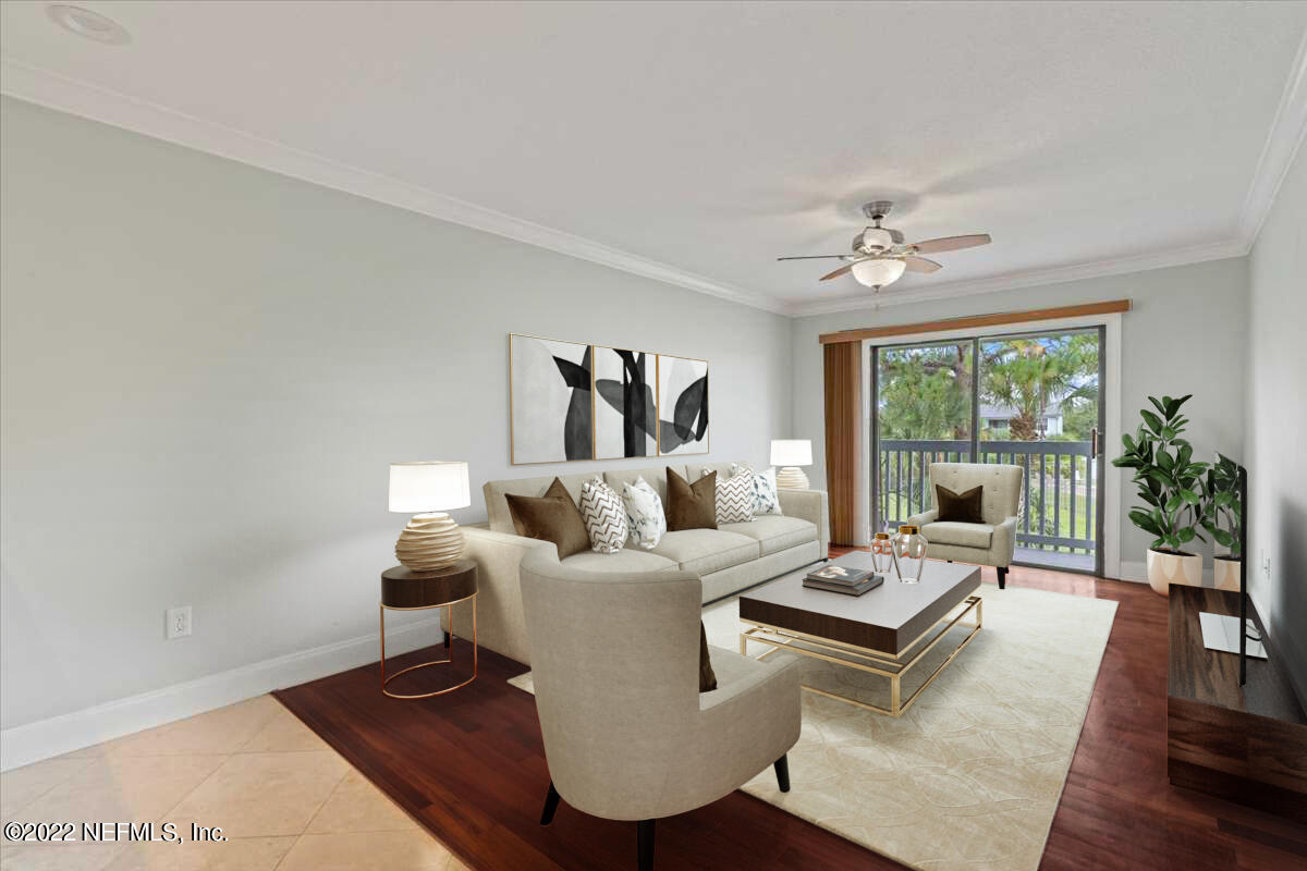 700 West Pope Road, Unit C20 St. Augustine, FL 32080 - Photo 3 of 15 a living room with furniture and a large window