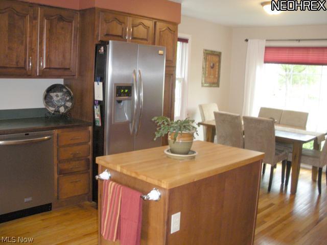 1144 Garman Road Akron, OH 44313 - Photo 8 of 22 Lots of counter space and cabinets, open to the dining room great for entertaining, bright and airy...
