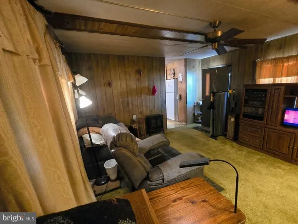 a room with furniture and a flat screen tv