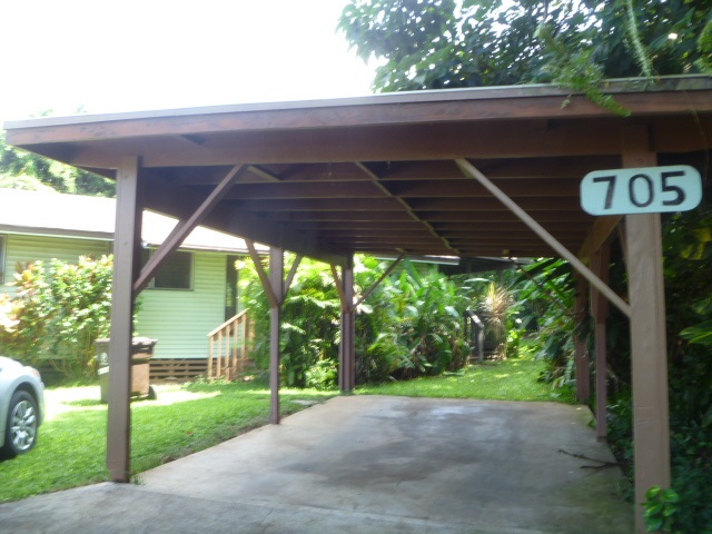 705 Haiku Road Haiku, HI 96708 - Photo 1 of 22 a view of a porch with a yard