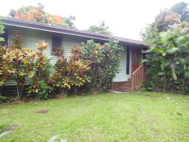 705 Haiku Road Haiku, HI 96708 - Photo 2 of 22 a view of a backyard with plants