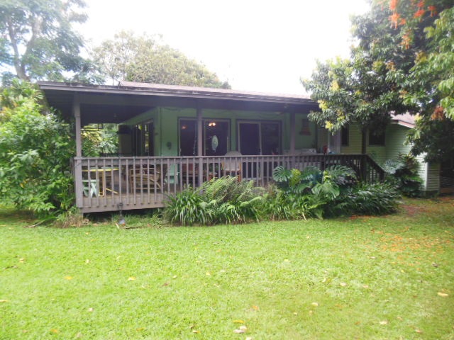 705 Haiku Road Haiku, HI 96708 - Photo 5 of 22 a view of a house with backyard and porch