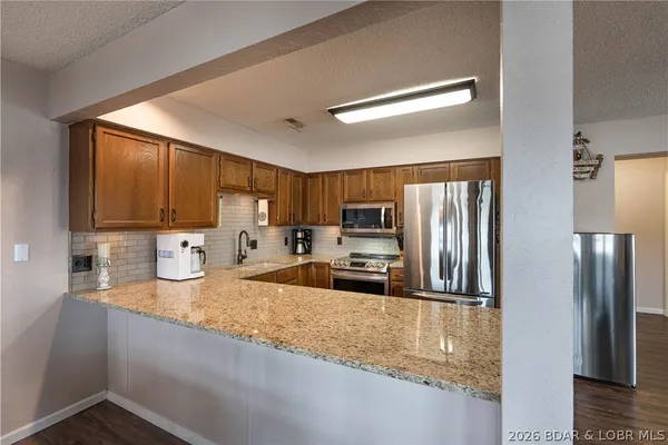 $215,000 | 103 Rock Dove Lane, Unit 1A, Camdenton, MO 65020