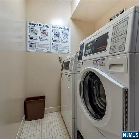 160 Overlook Avenue, Unit 18D Hackensack, NJ 07601 - Photo 12 of 14 a room with a washer and dryer