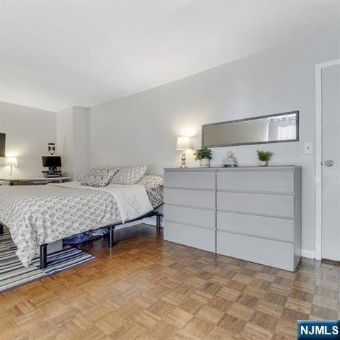 160 Overlook Avenue, Unit 18D Hackensack, NJ 07601 - Photo 8 of 14 a bedroom with a bed and window