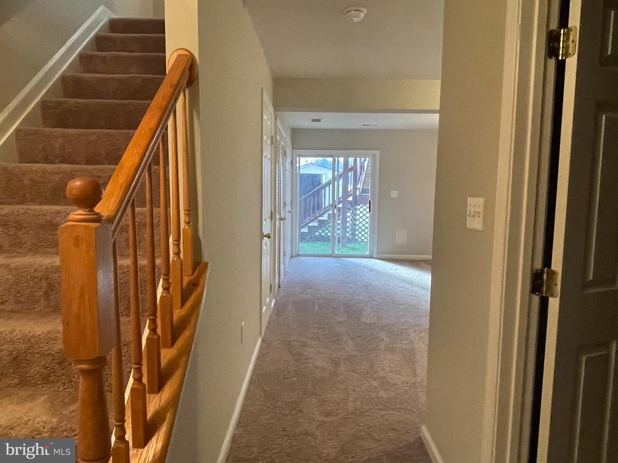 27 Townes Place Fredericksburg, VA 22405 - Photo 12 of 34 a view of a hallway with wooden floor and entryway