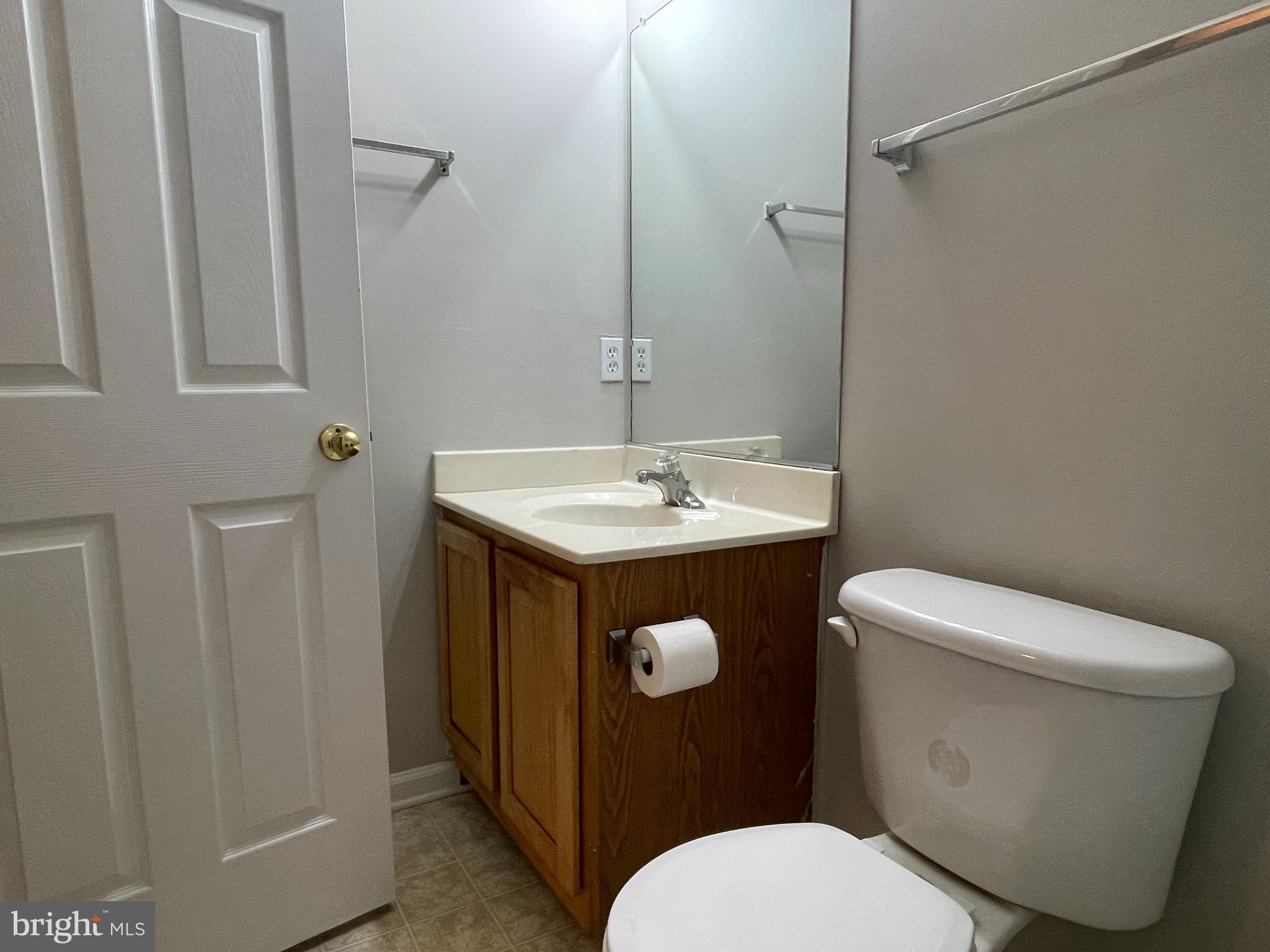 27 Townes Place Fredericksburg, VA 22405 - Photo 24 of 34 a white toilet sitting next to a bathroom sink