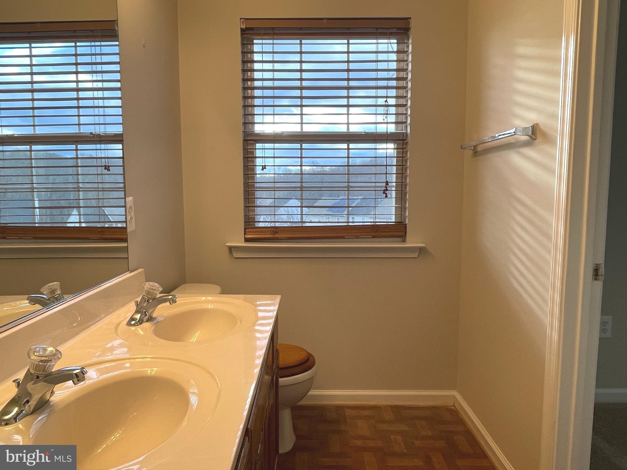 27 Townes Place Fredericksburg, VA 22405 - Photo 26 of 34 a bathroom with a granite countertop sink and a mirror