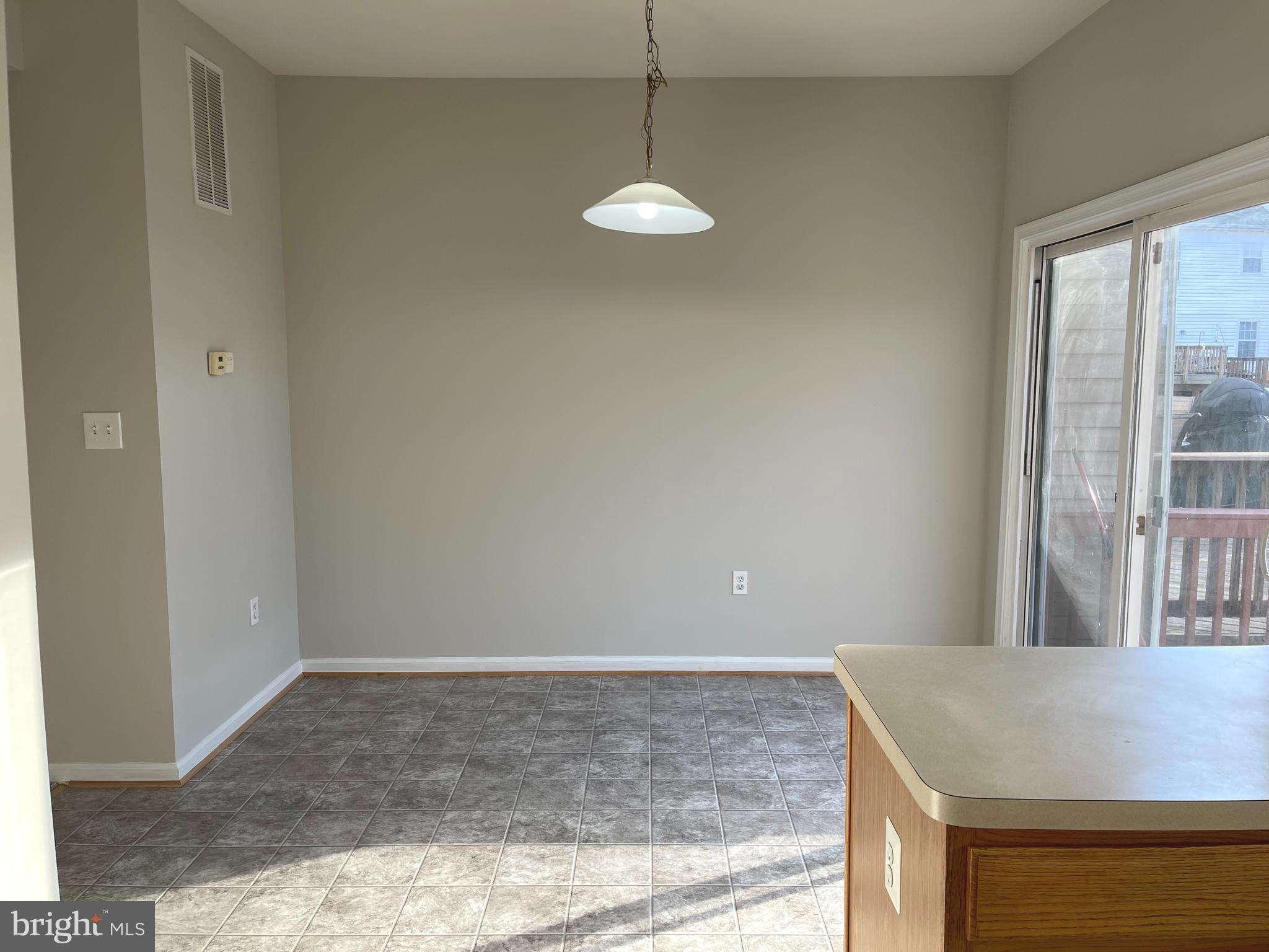 27 Townes Place Fredericksburg, VA 22405 - Photo 5 of 34 a view of a room with window and ceiling fan
