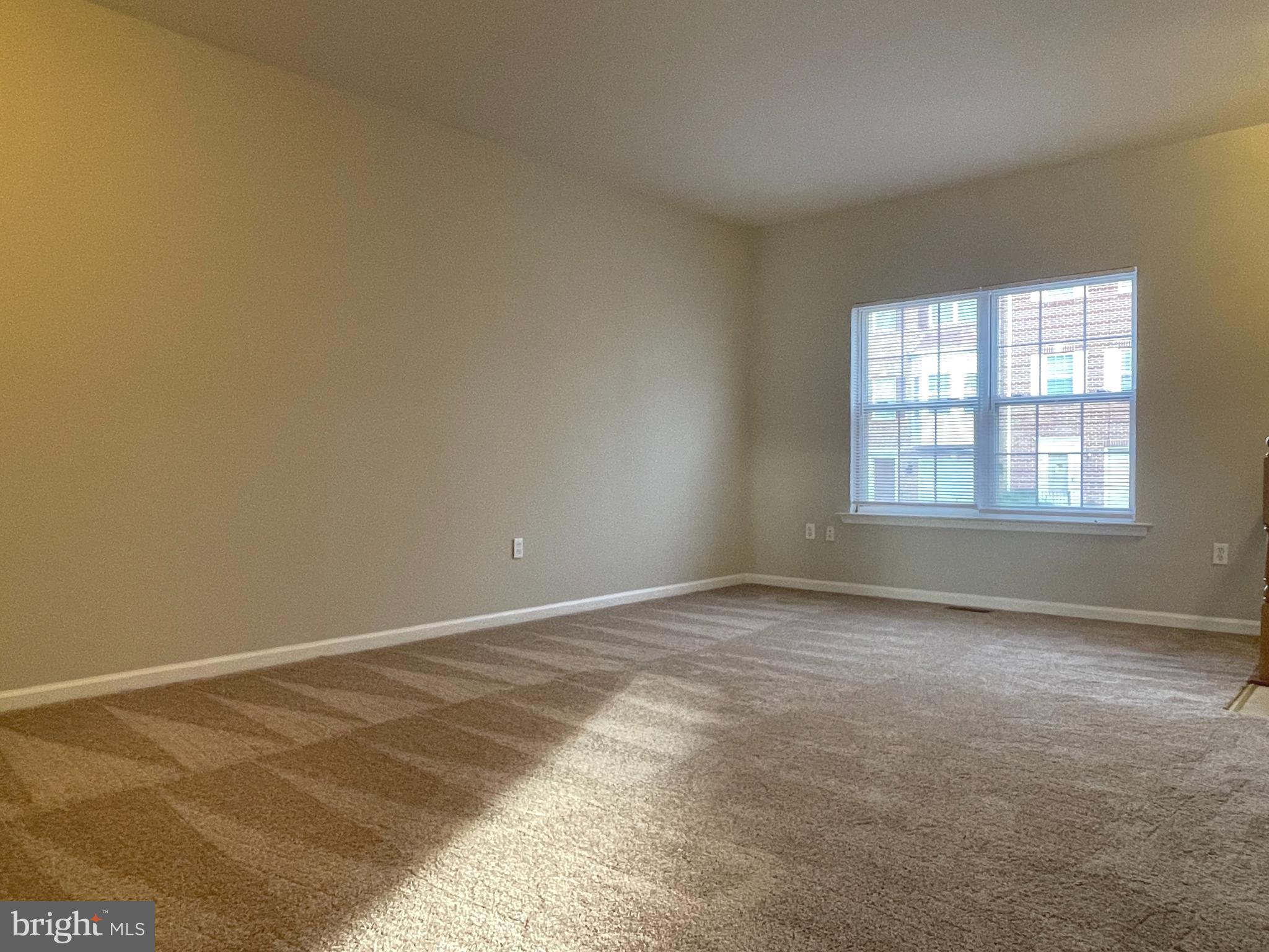 27 Townes Place Fredericksburg, VA 22405 - Photo 9 of 34 an empty room with a window