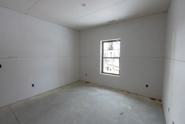 an empty room with a window