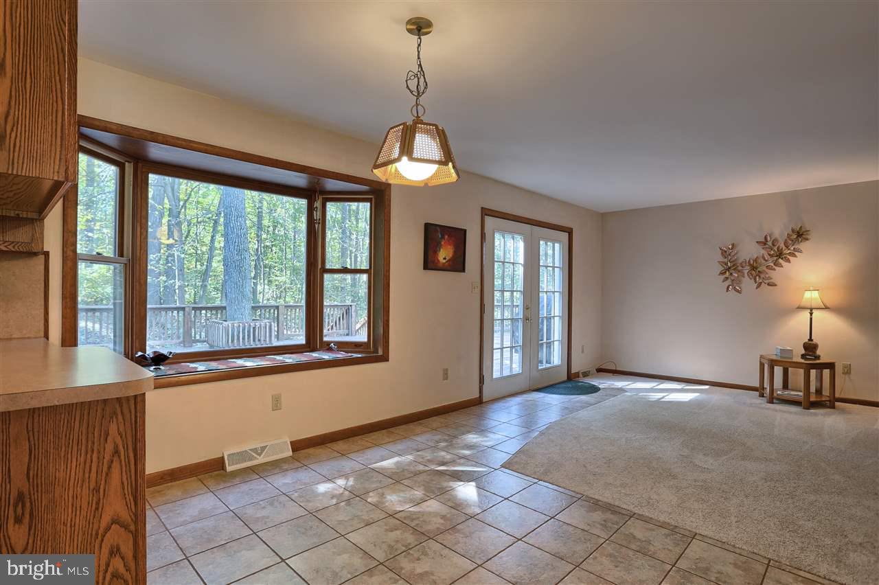 854 Bellaire Road Elizabethtown, PA 17022 - Photo 8 of 25 a view of an empty room with a window