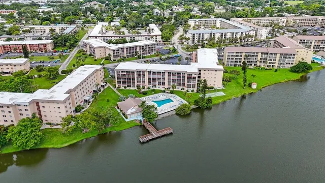 an aerial view of a house with a garden