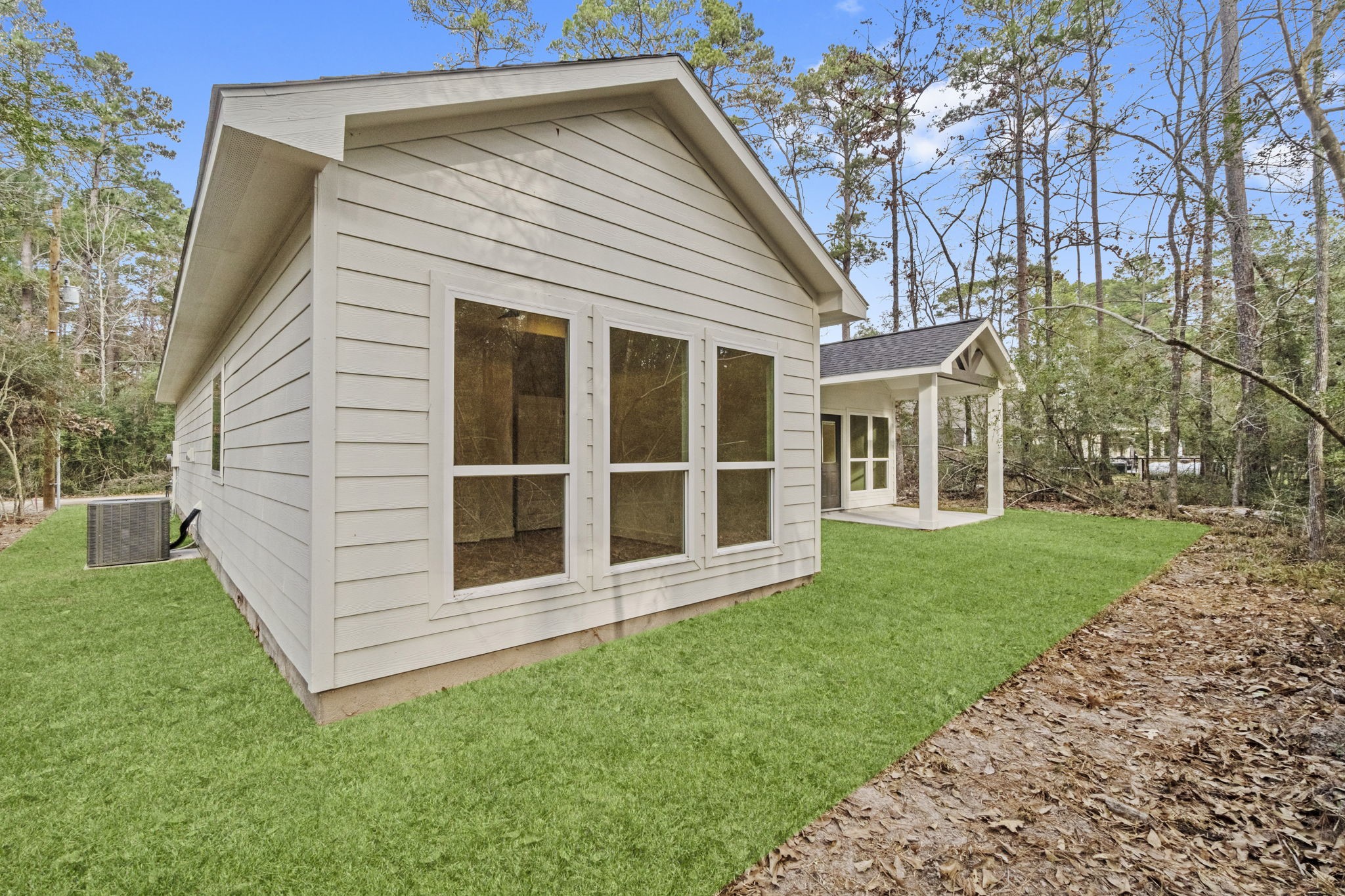241 Clear Springs Trinity, TX 75862 - Photo 32 of 46 a view of a house with a garden