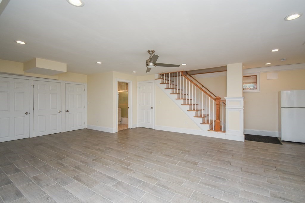 32 Cameron Street Everett, MA 02149 - Photo 17 of 22 a view of empty room with wooden floor