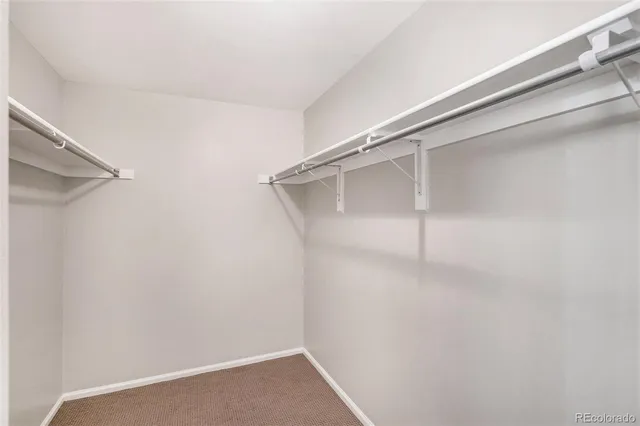 a view of an empty walk in closet