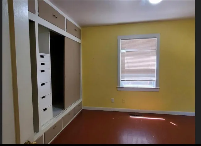 a view of an empty room with window