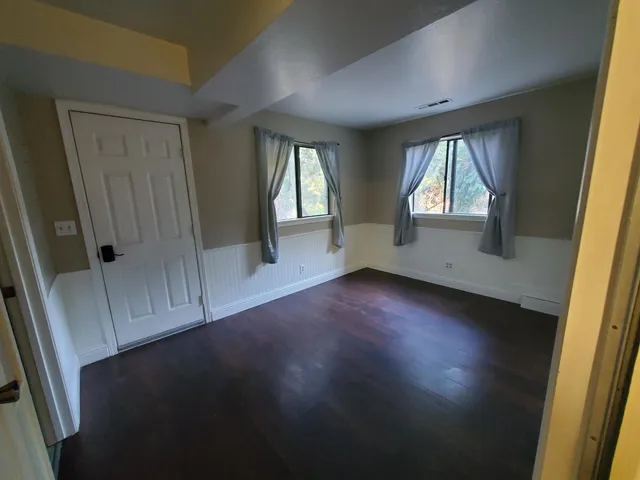 an empty room with windows