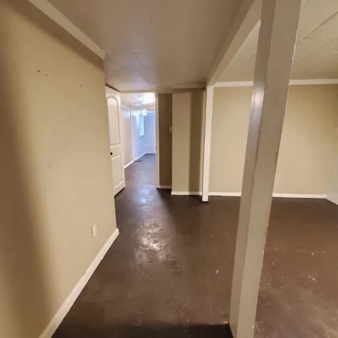 a view of balcony with wooden floor