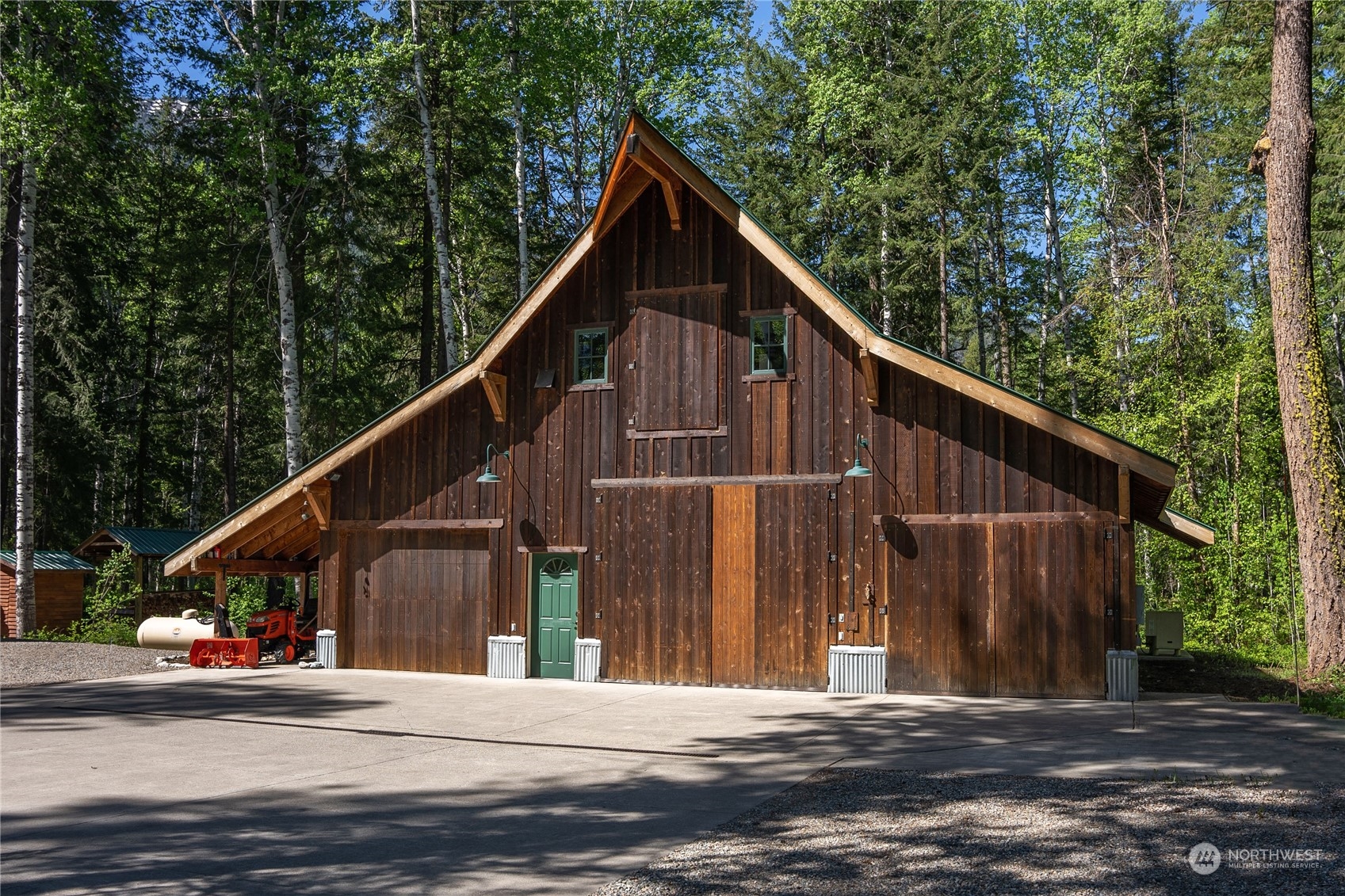 699 Lost River Road Mazama, WA 98833 - Photo 14 of 40 a view of a house with a street
