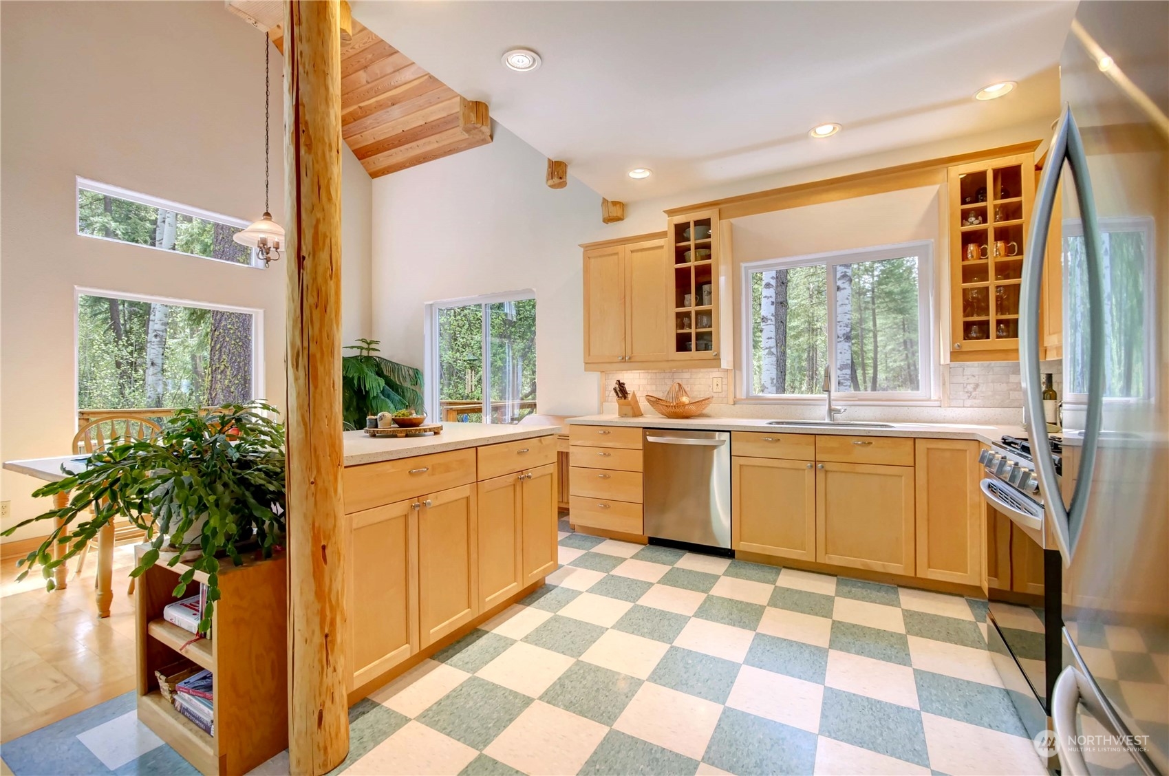 699 Lost River Road Mazama, WA 98833 - Photo 18 of 40 a kitchen with a sink a counter top space and a large window