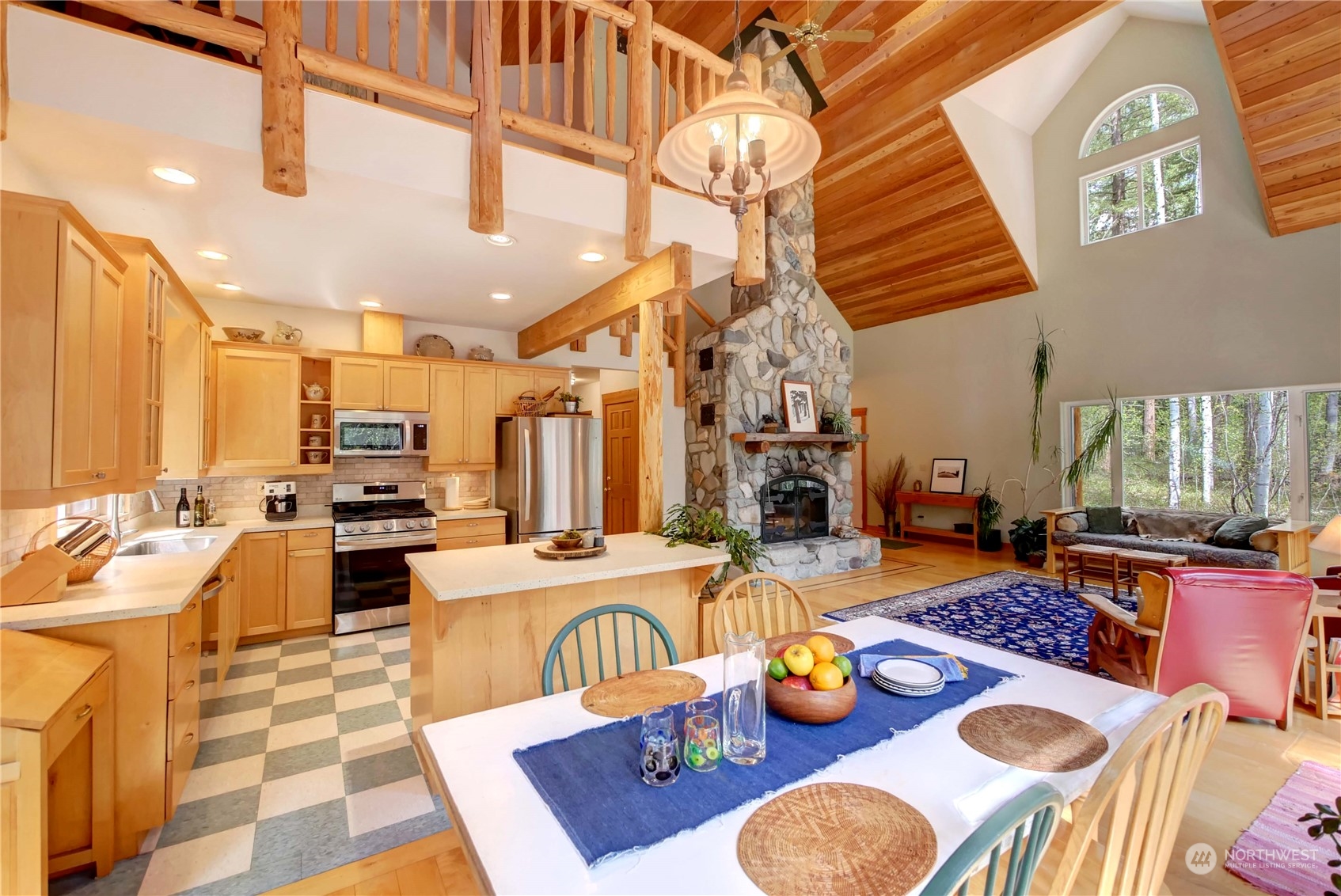699 Lost River Road Mazama, WA 98833 - Photo 25 of 40 a living room with furniture and next to a window