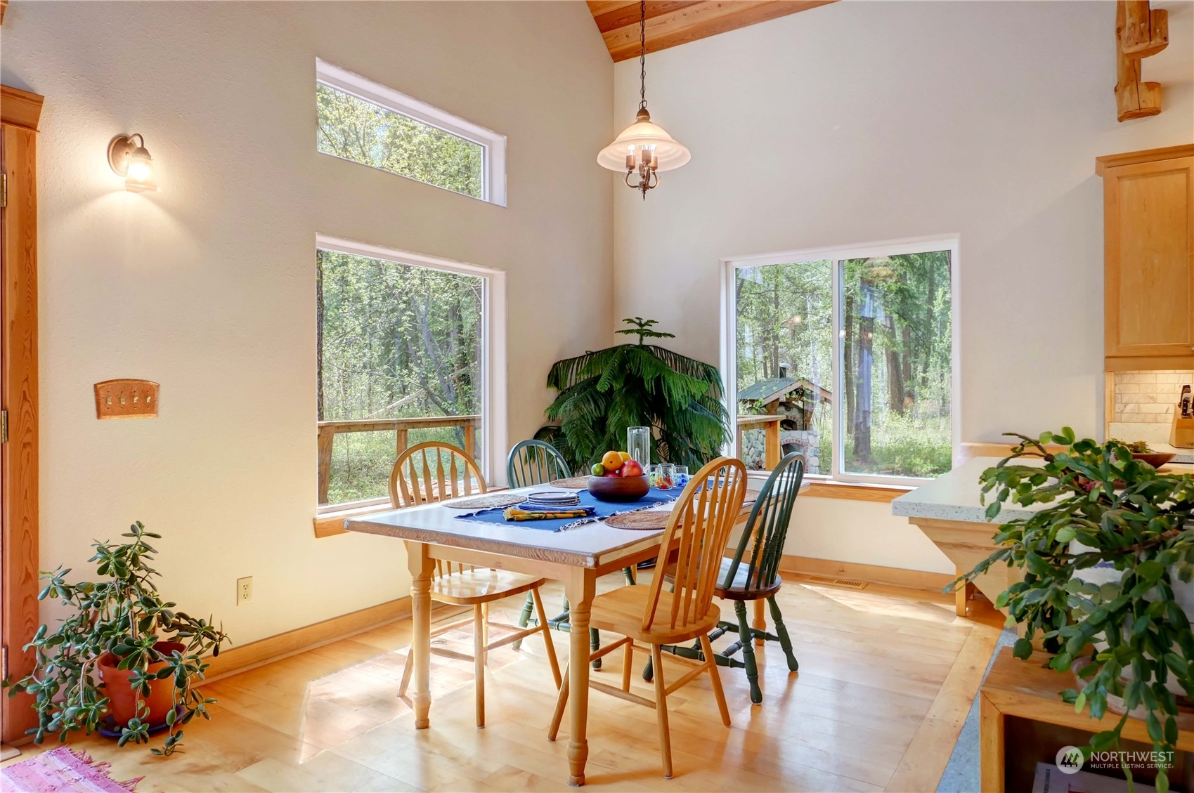 699 Lost River Road Mazama, WA 98833 - Photo 26 of 40 a view of a dining room with furniture window and outside view