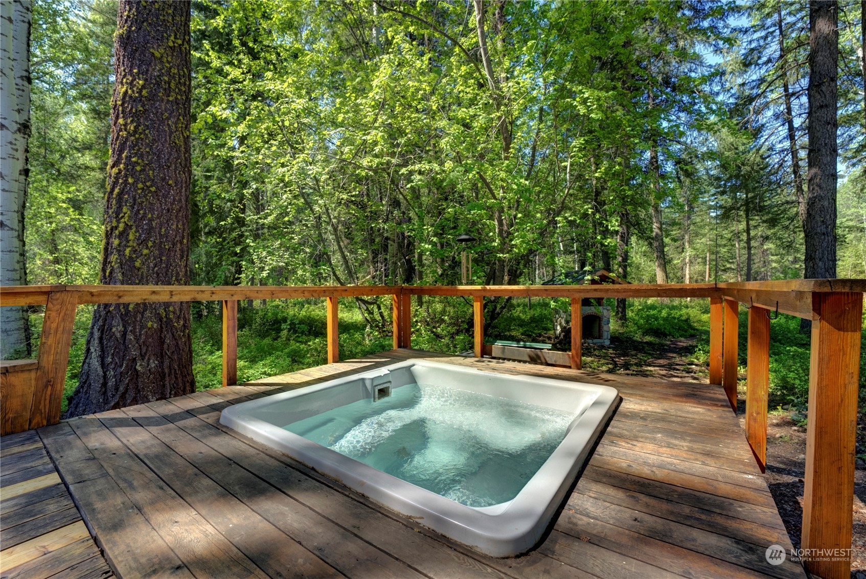 699 Lost River Road Mazama, WA 98833 - Photo 28 of 40 a view of swimming pool with seating space