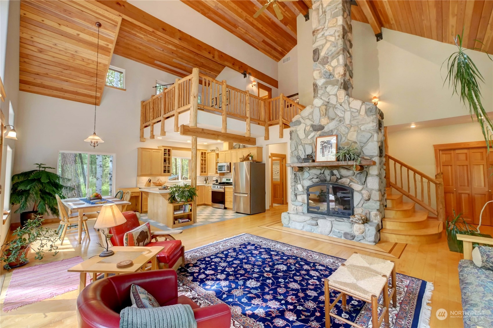 699 Lost River Road Mazama, WA 98833 - Photo 30 of 40 a outdoor living space with furniture and a chandelier